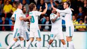Los jugadores del Real Madrid celebran un gol de Bale