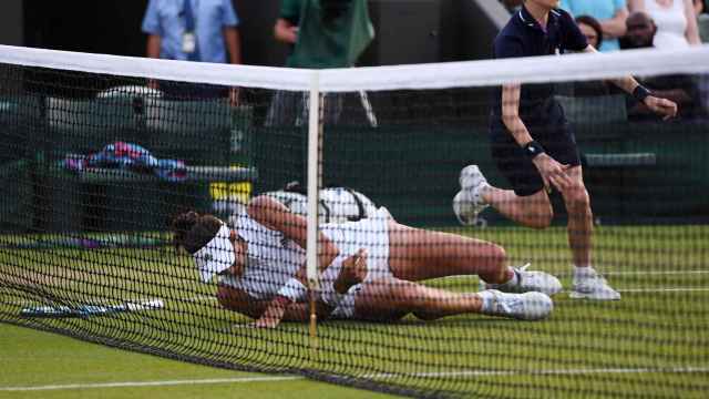 Muguruza, durante su partido de segunda ronda de Wimbledon.
