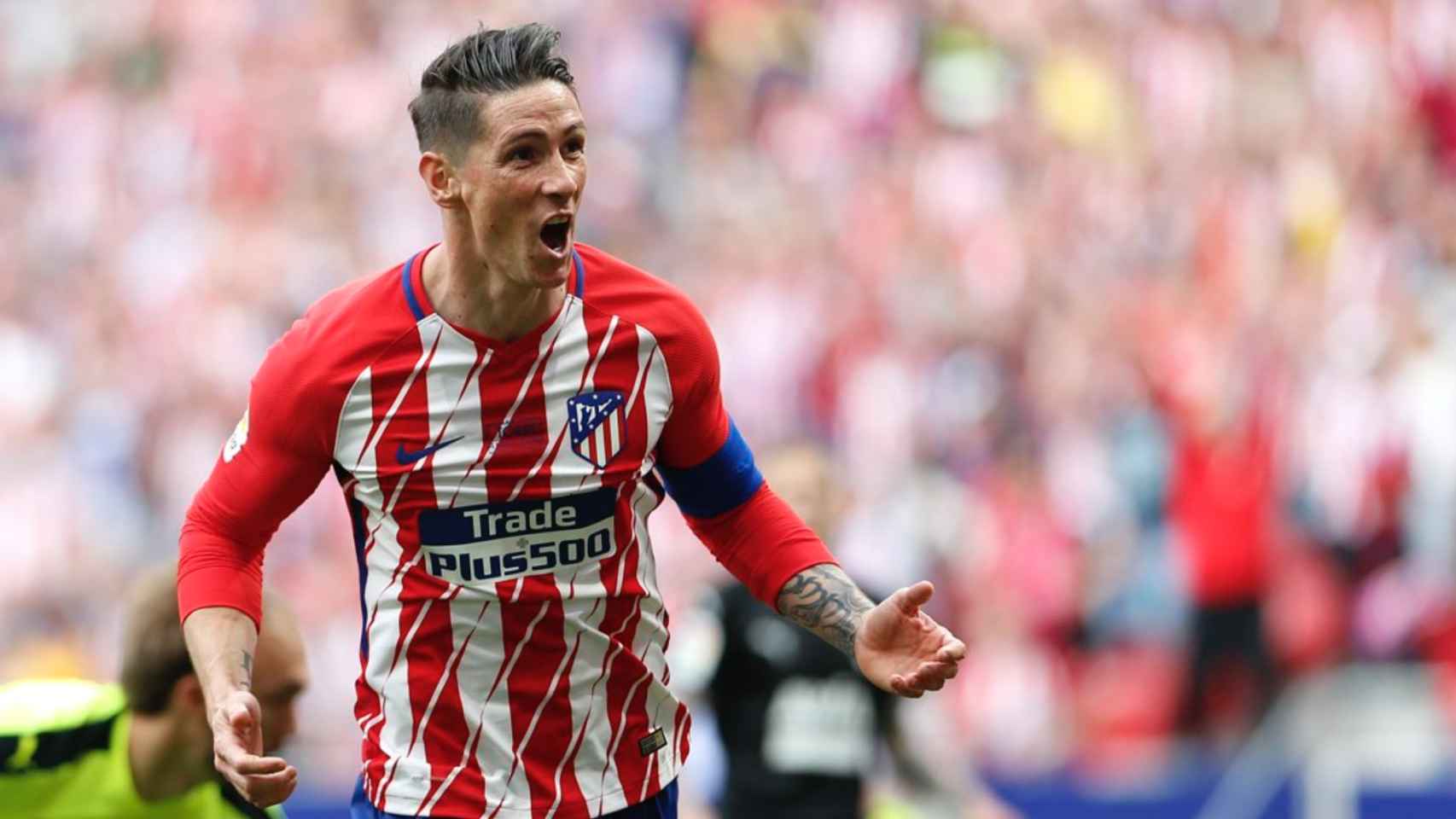 Fernando Torres celebra un gol con el Atlético.
