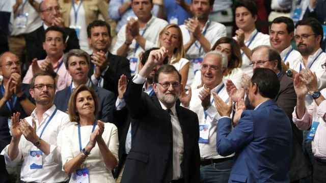 Mariano Rajoy, a su llegada al congreso del PP, el de su despedida.