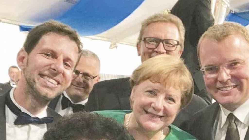 Piotr Beczala junto a Angela Merkel