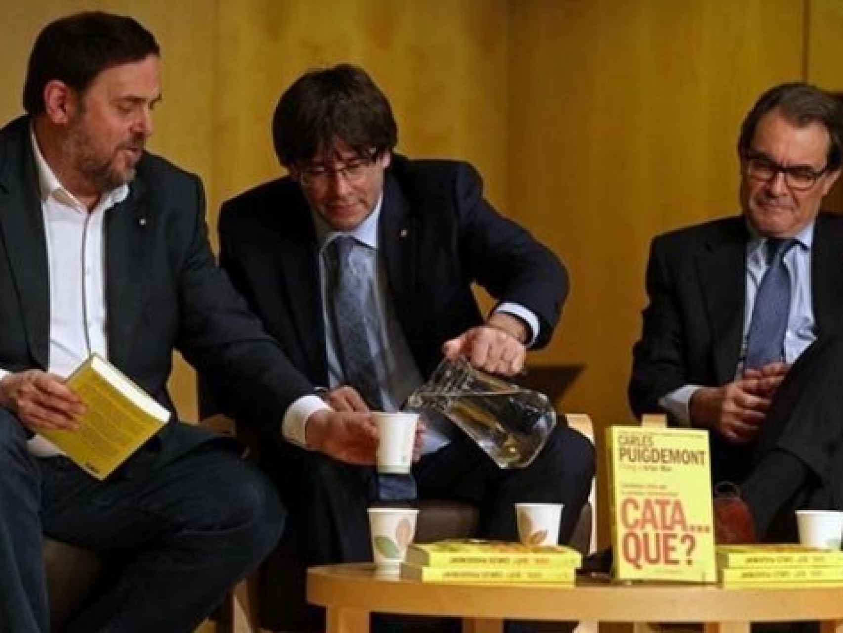 Oriol Junqueras, Carles Puigdemont y Artur Mas durante la presentación de un libro.