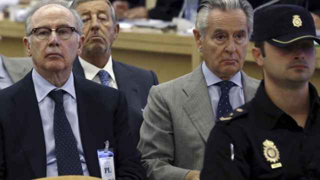 Los expresidentes de Bankia y Caja Madrid, Rodrigo Rato y Miguel Blesa, durante el juicio por las 'tarjetas Black' en la Audiencia Nacional.