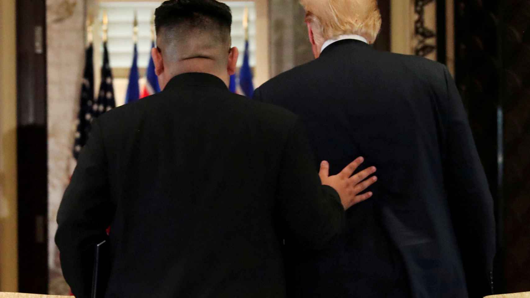 Trump y Kim Jong-un en su reunión en Shangai