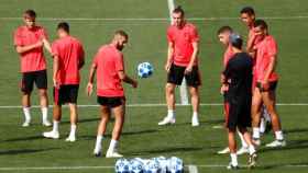 Varios jugadores del Real Madrid en el entrenamiento