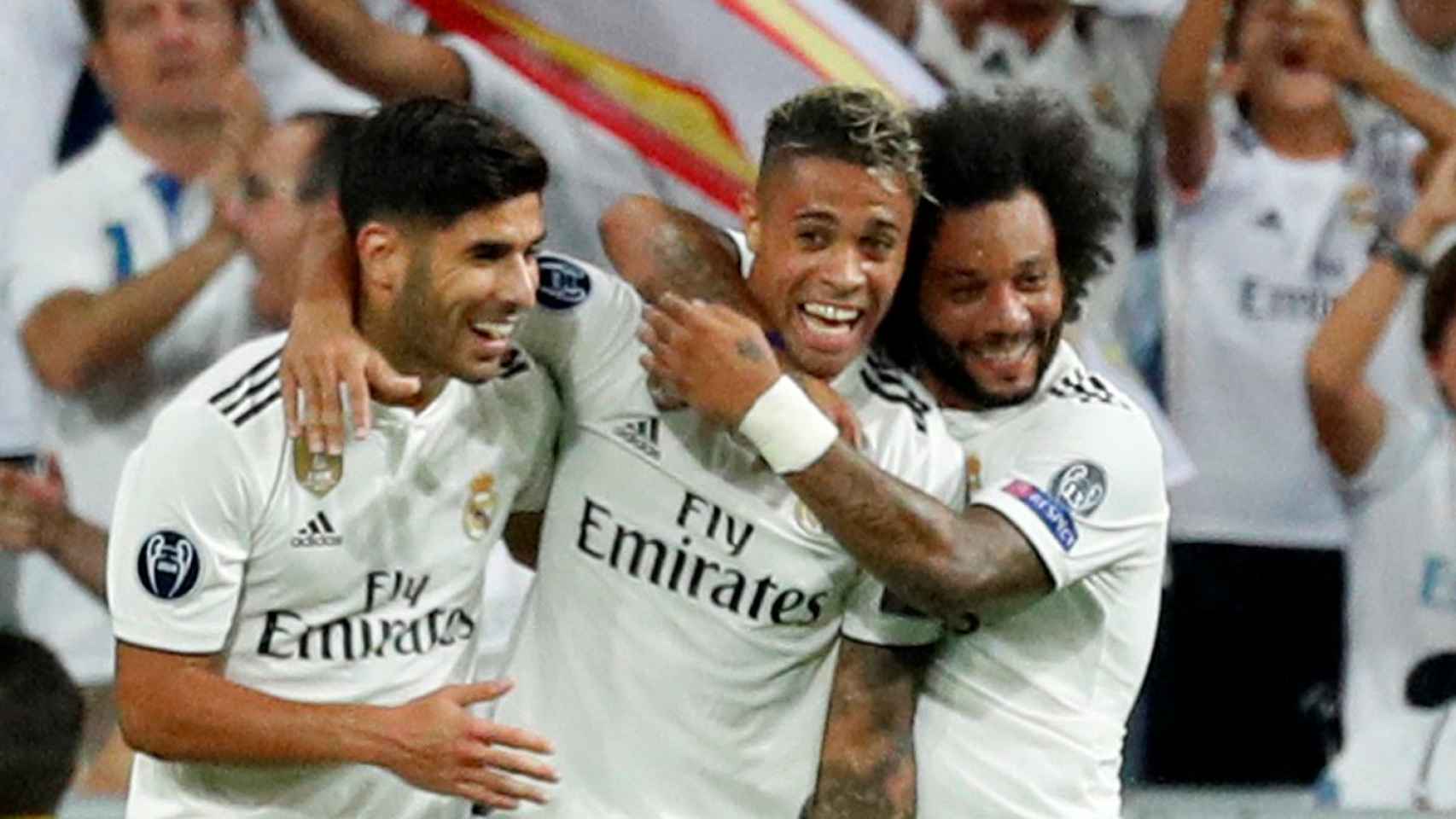 Asensio, Mariano y Marcelo celebran un gol en el Santiago Bernabéu