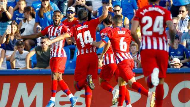 Los jugadores del Atlético celebran el gol de Thomas ante el Getafe en La Liga