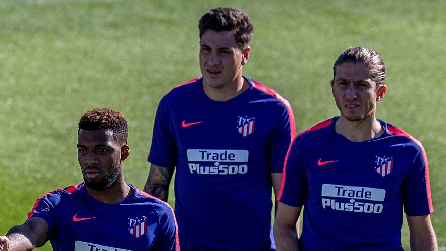 Giménez, Filipe y Lemar, en un entrenamiento del Atlético de Madrid