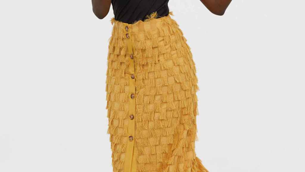 Falda de flecos color mostaza de H&M