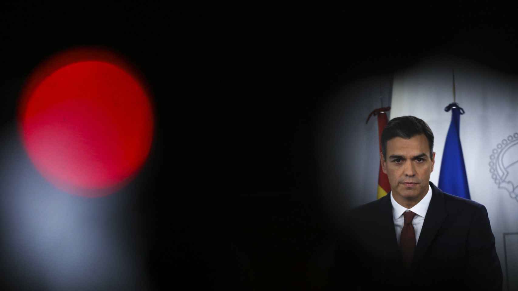 Spain's Prime Minister Pedro Sanchez listens to a question during a news conference at the Moncloa Palace in Madrid