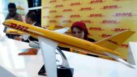 Model of a plane bearing the logo of the German postal and logistics group Deutsche Post DHL is displayed during Africa 2018 Forum at the Red Sea resort of Sharm el-Sheikh
