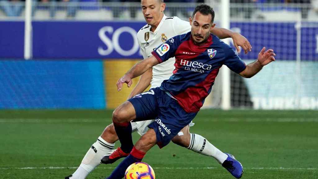Marcos Llorente, contra Gürler en el Huesca - Real Madrid