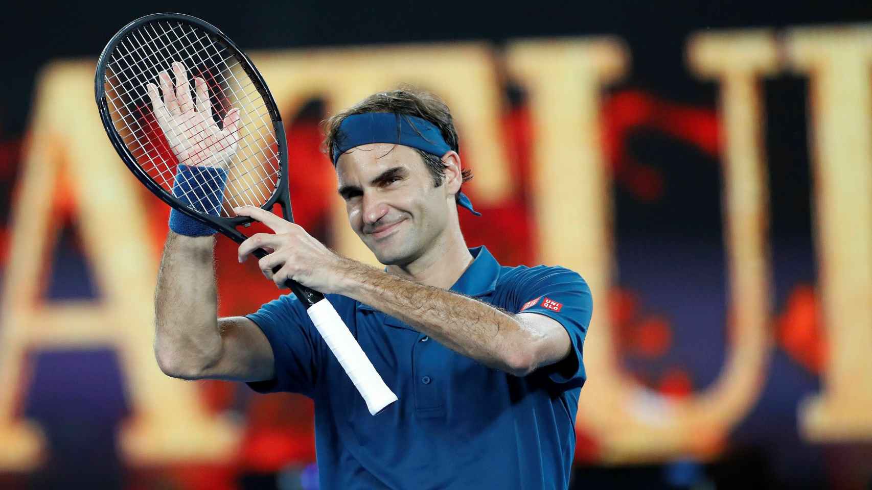 Roger Federer celebra su victoria ante Taylor Fritz en la tercera ronda del Open de Australia