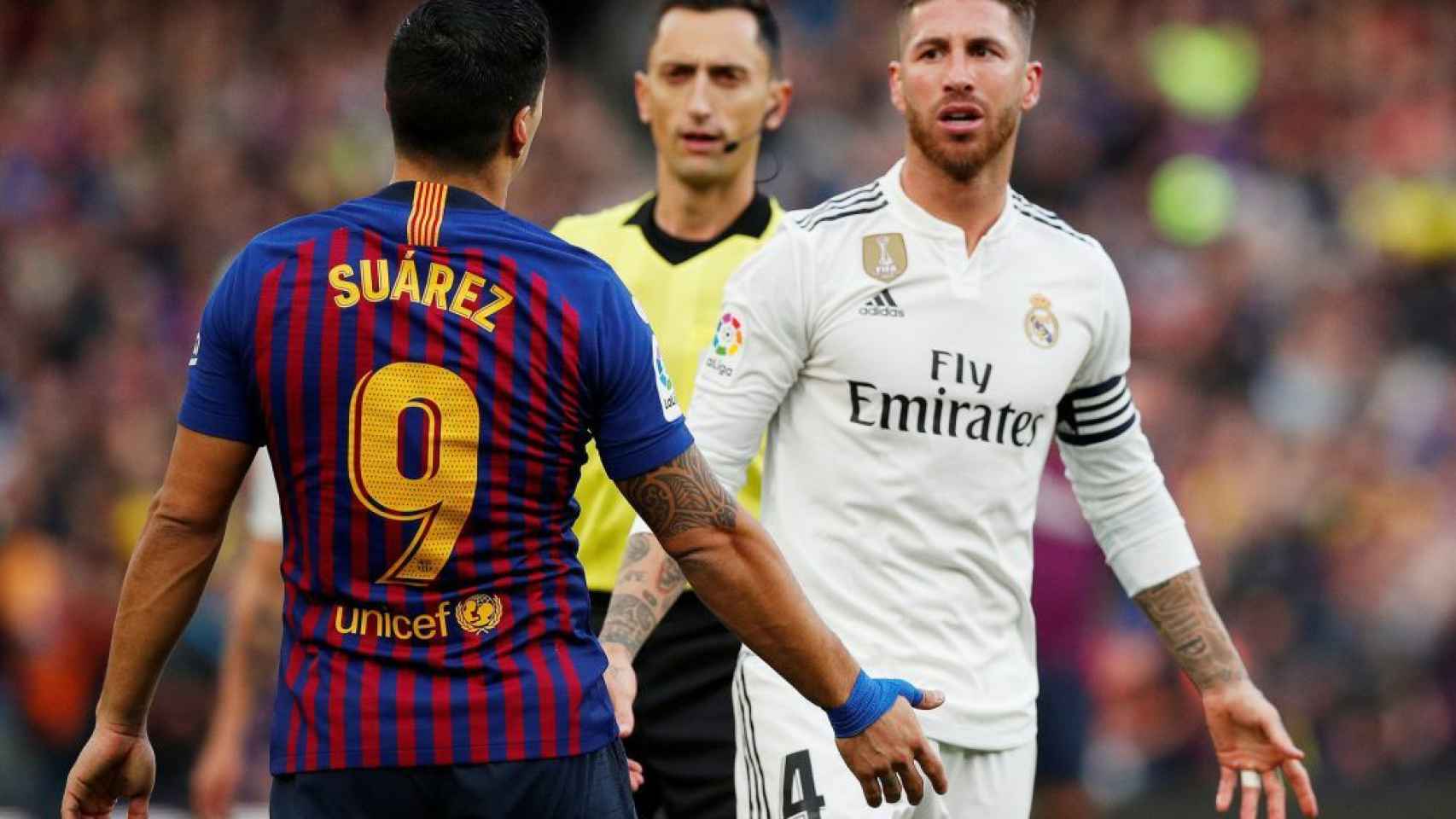 Luis Suárez y Sergio Ramos durante El Clásico