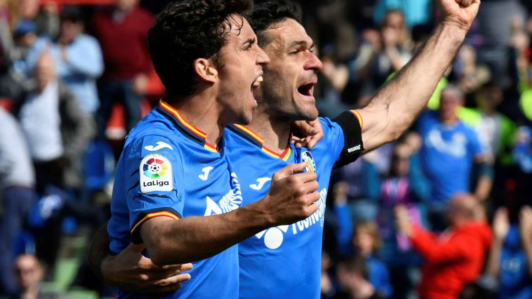 Jaime Mata y Jorge Molina celebran un gol del Getafe