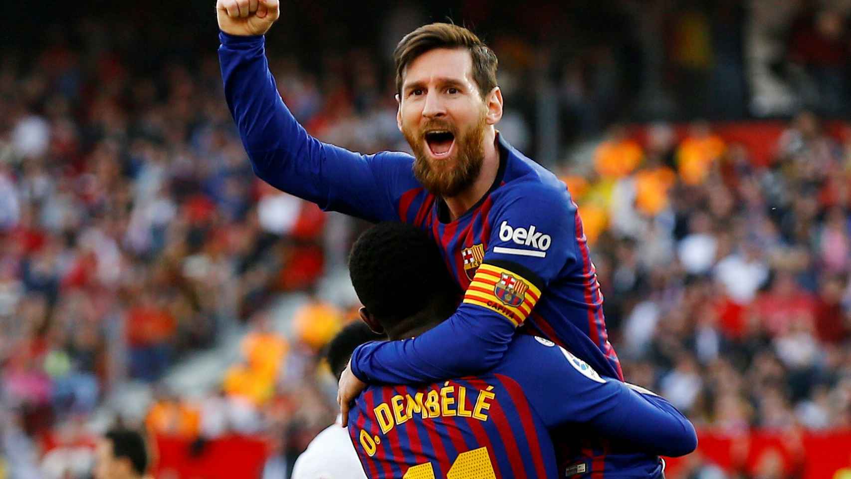 Messi y Dembélé celebran un gol con el Barcelona