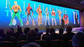 Slide sobre superhéroes en un evento empresarial.