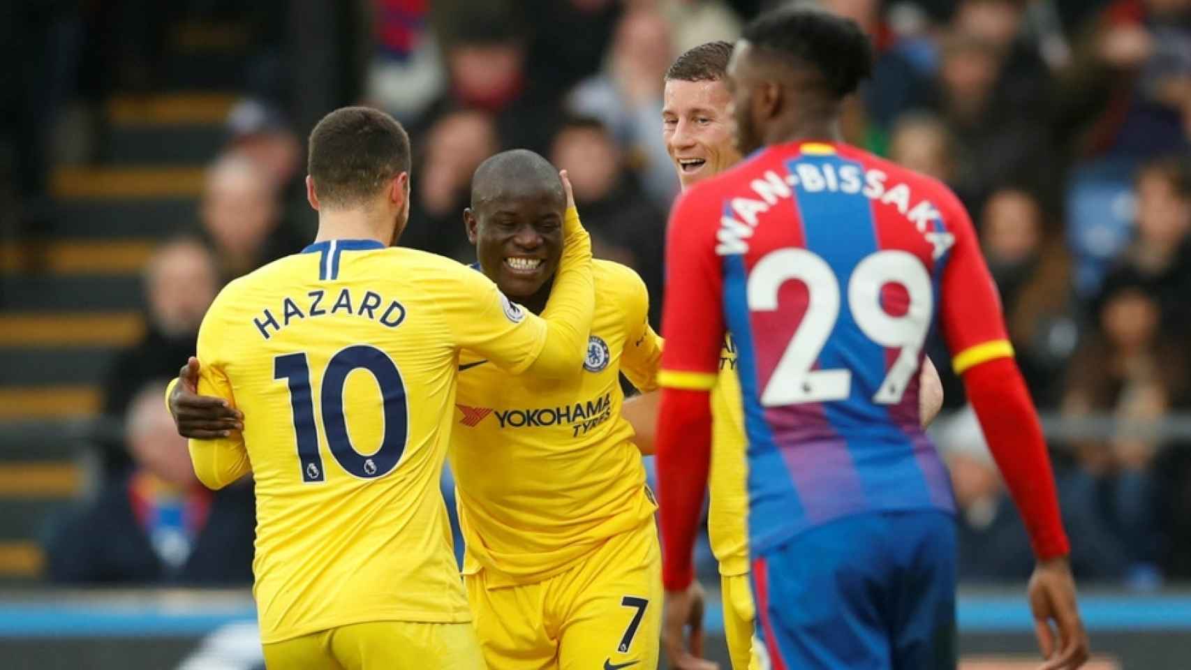 Hazard y Kanté celebran con el Chelsea