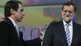 José María Aznar y Mariano Rajoy en una imagen de archivo.