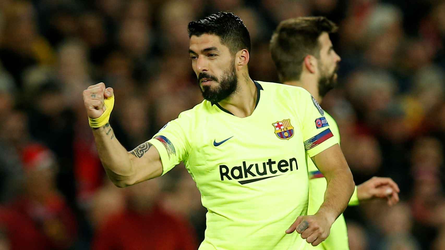 Luis Suárez celebra su gol en el Manchester United - Barcelona de la Champions League