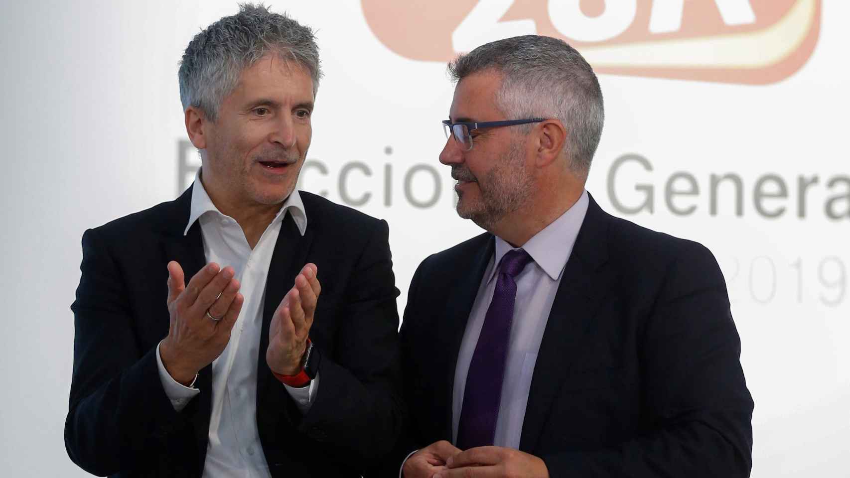 Fernando Grande-Marlaska, ministro del Interior, y Miguel Ángel Oliver, secretario de Estado de Comunicación.