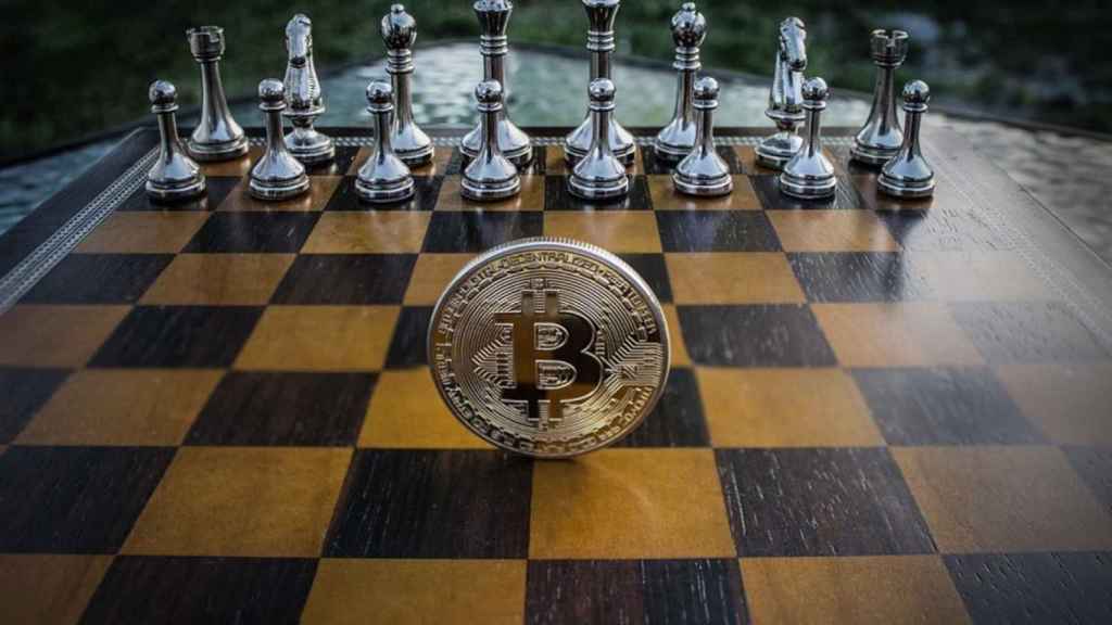 A currency of reference of the bitcoin on a chess board.