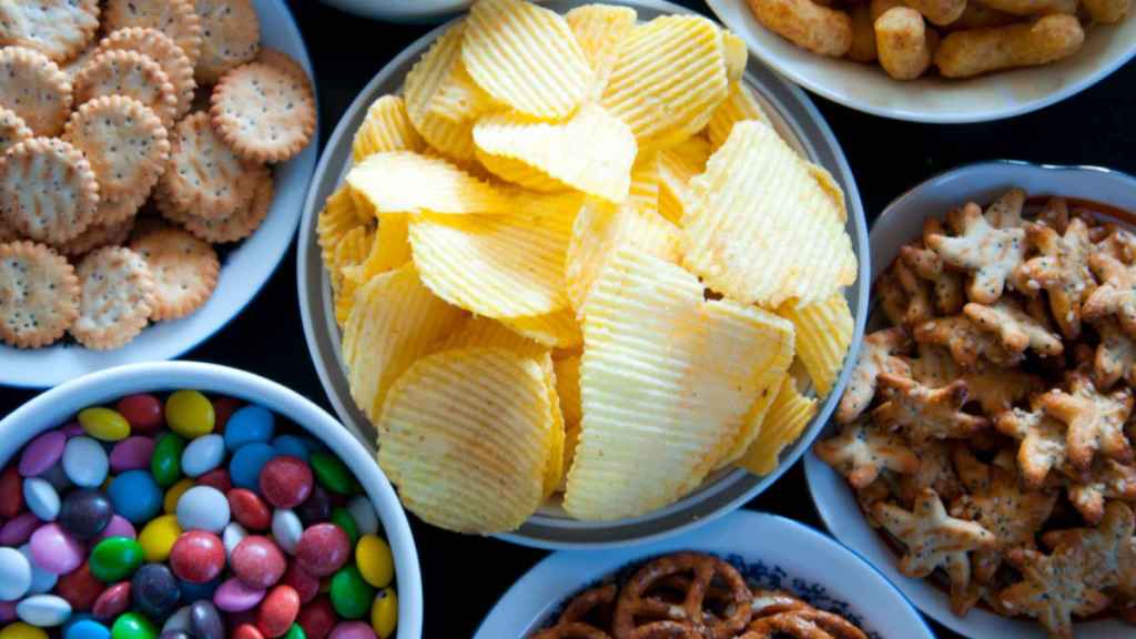 Muchos 'snacks' son ricos en grasas trans.
