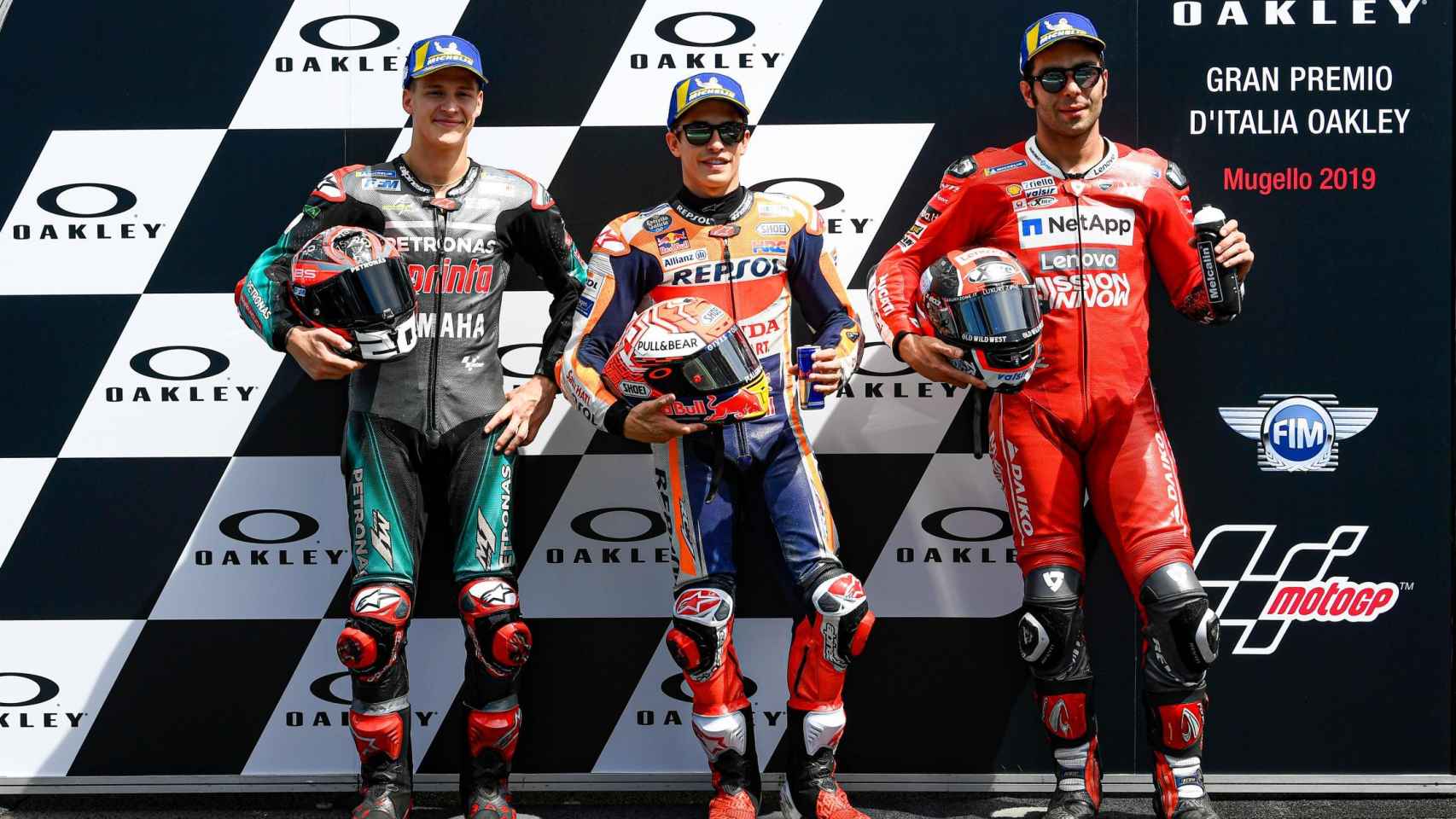 Quartararo, Márquez y Petrucci, los pilotos de la primera línea de la parrilla del GP de Italia.
