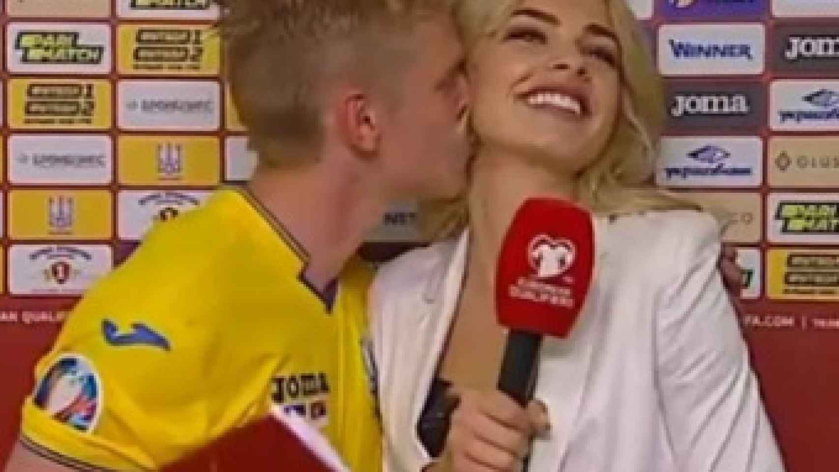 Zinchenko se 'marca' un Casillas: su beso a la reportera ucraniana tras ganar a Serbia