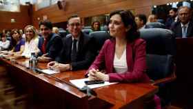 La candidata del PP a la Presidencia de la Comunidad de Madrid, Isabel Díaz Ayuso, en su escaño en la Asamblea de Madrid.