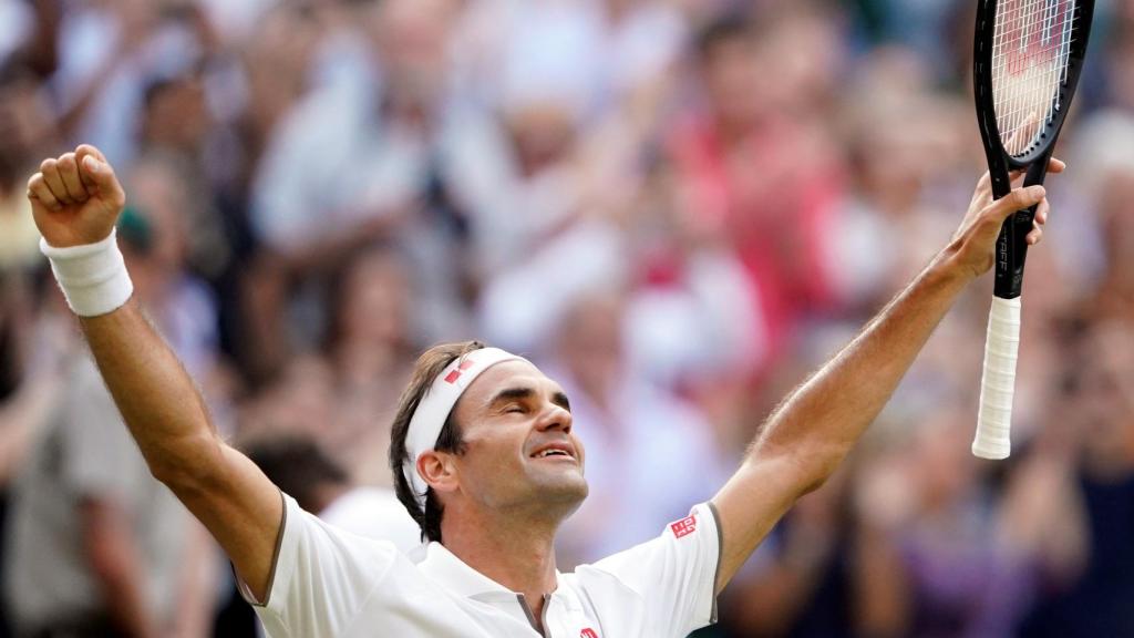 Federer celebra su victoria contra Nadal