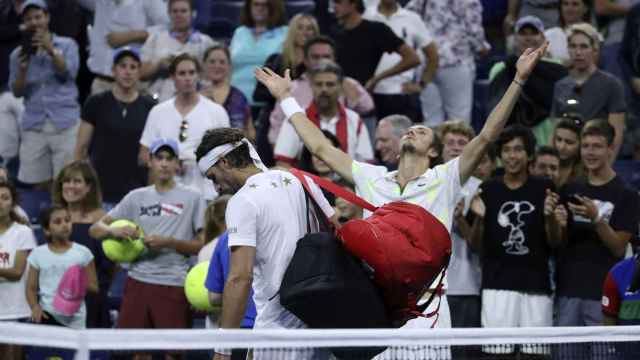 Medvedev celebra su victoria ante López en el US Open.