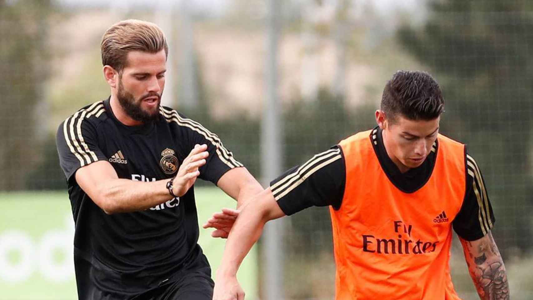 James Rodríguez y Nacho, en un entrenamiento del Real Madrid