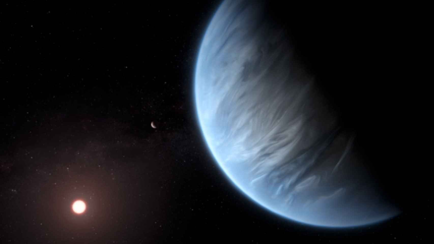 Esta recreación artística muestra el planeta K2-18b, su estrella anfitriona y un planeta acompañante. / ESA / Hubble / M. Kornmesser