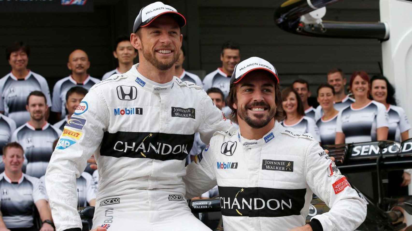 Button y Fernando Alonso