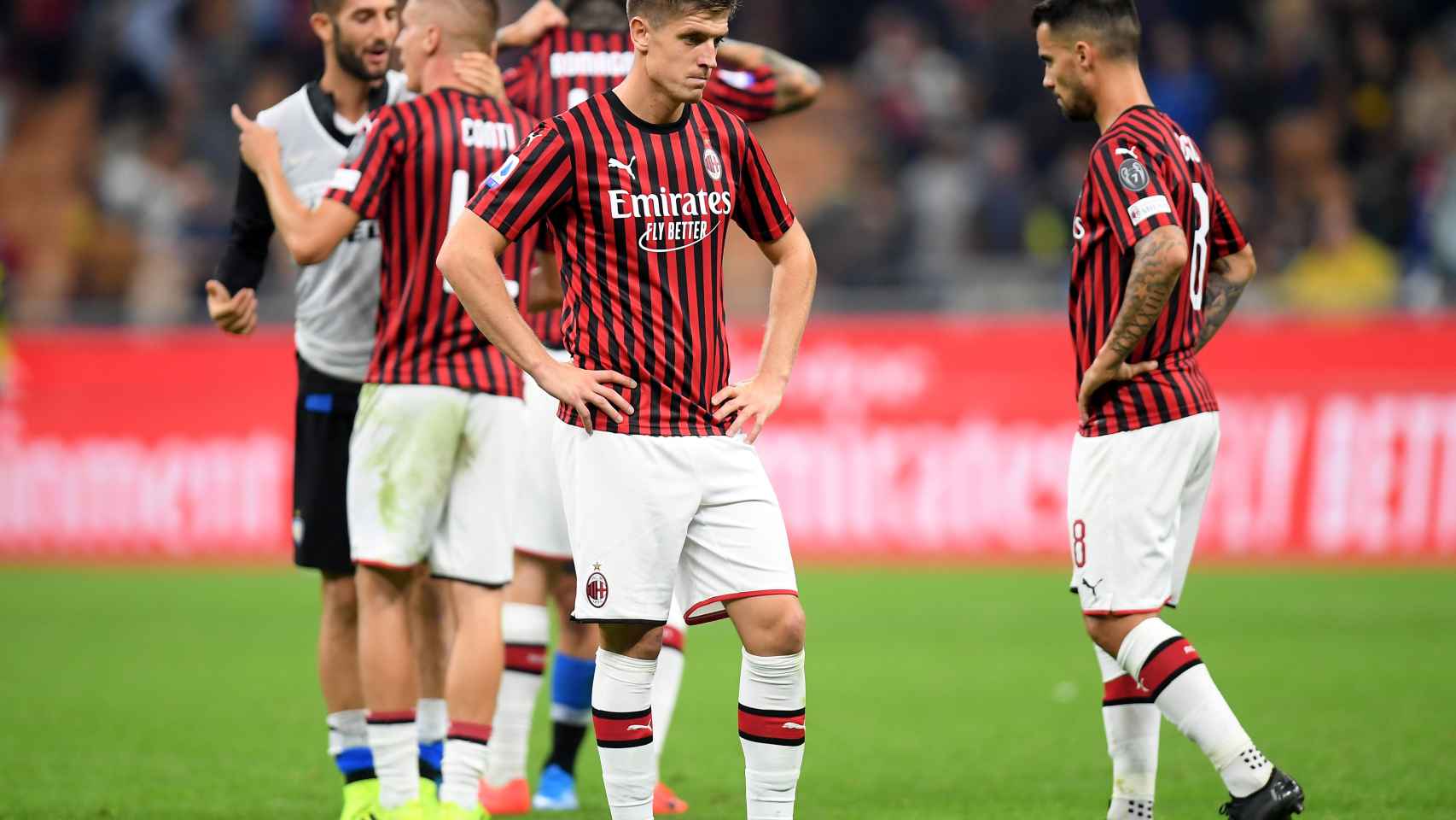 Jugadores del Milan durante un partido de esta temporada ante el Inter de Milán