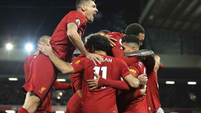 Los jugadores del Liverpool celebran uno de los goles ante el Manchester City