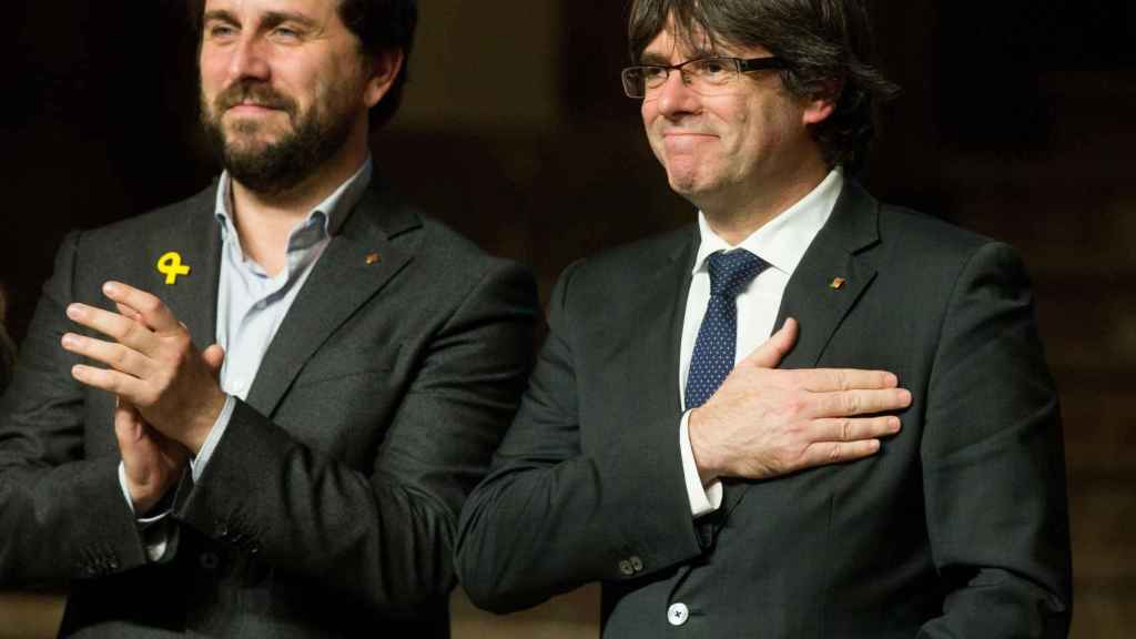 Puigdemont y Comín./