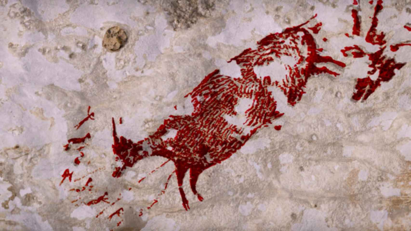 Sale a la luz la obra más antigua la humanidad: una escena caza búfalos y cerdos