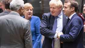 Johnson conversa con Merkel y Macron durante su última cumbre en octubre
