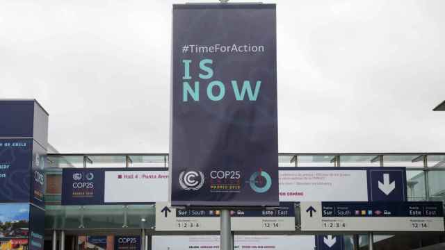 Cartel de la COP25 en el que se lee Time for action is now ('Ahora es el momento de actuar').