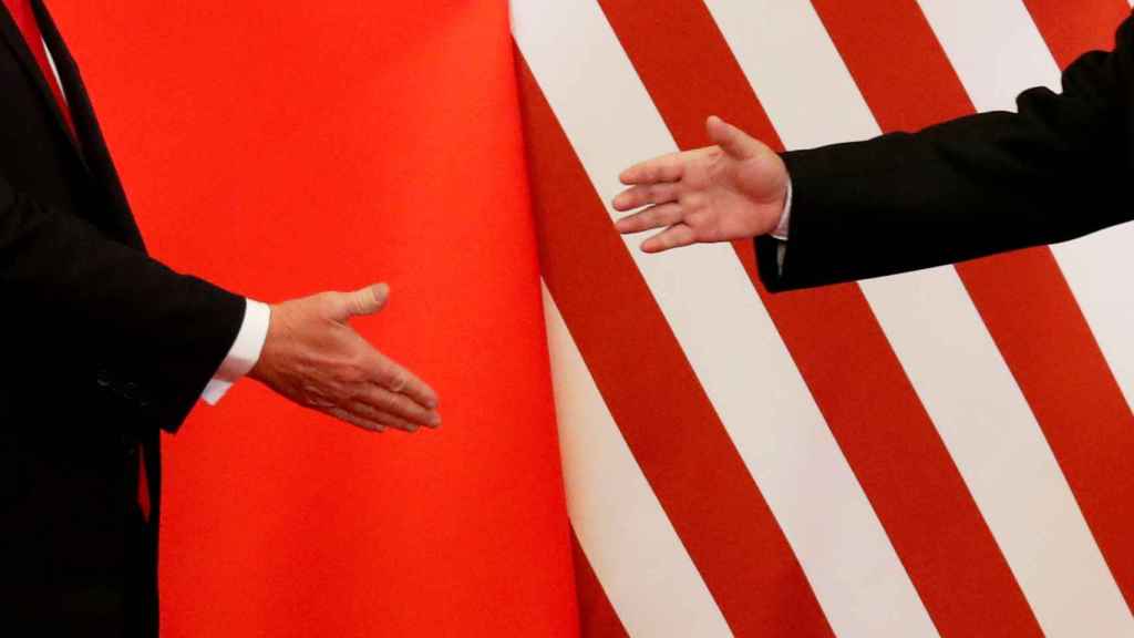 Las manos de Xi Jinping y Donald Trump en la cumbre del G20 celebrada en junio en Osaka, Japón.