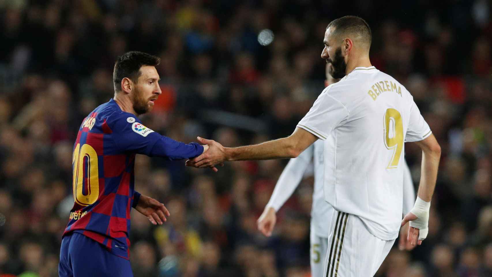 Leo Messi y Karim Benzema, durante El Clásico