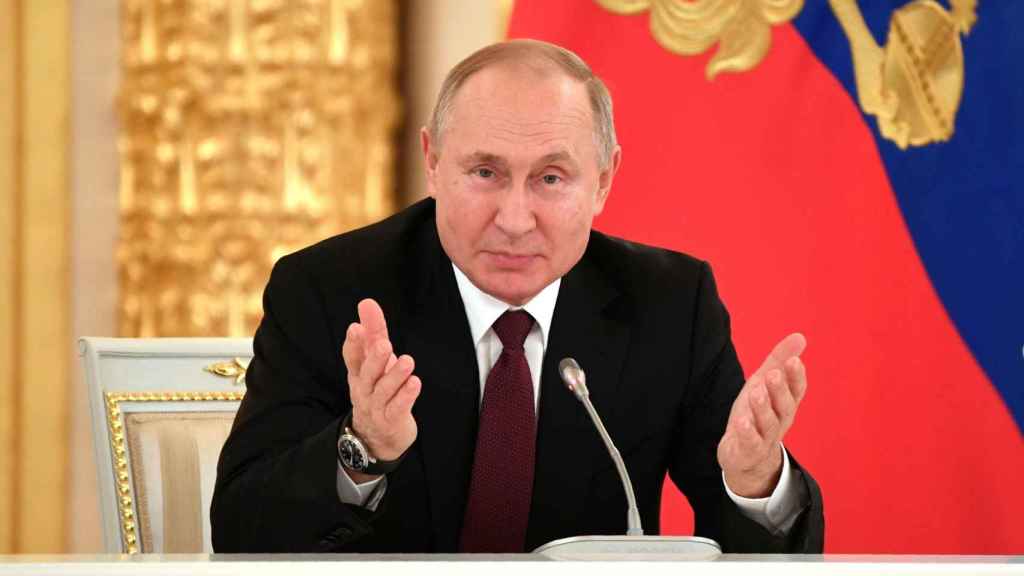 Russian President Vladimir Putin speaks during his meeting with business community at the Kremlin in Moscow