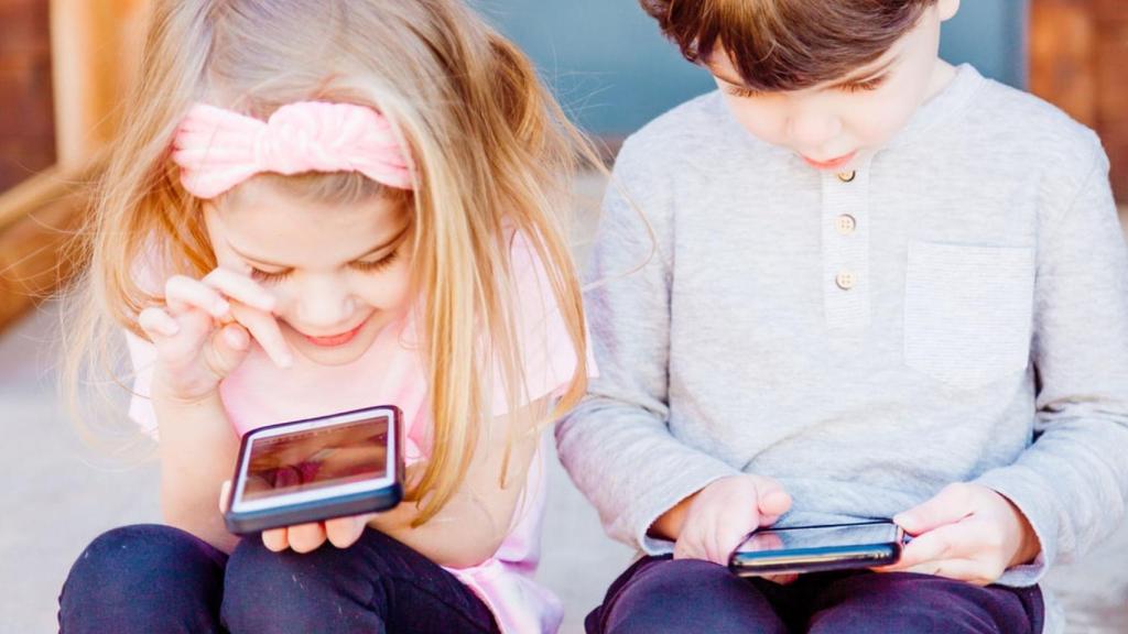 Children playing with phones.