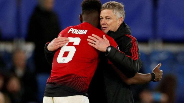 Paul Pogba, junto a Ole Gunnar Solskjaer