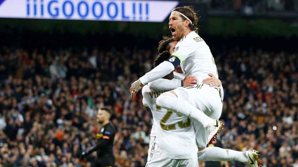 Isco, Vinicius y Sergio Ramos celebran el gol ante el Manchester City