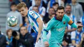 Odegaard y Messi