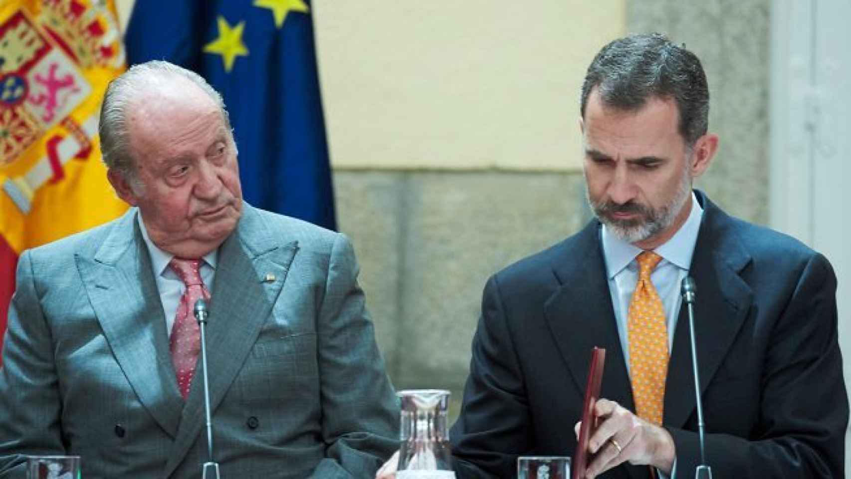 Juan Carlos I y Felipe VI en un acto oficial.