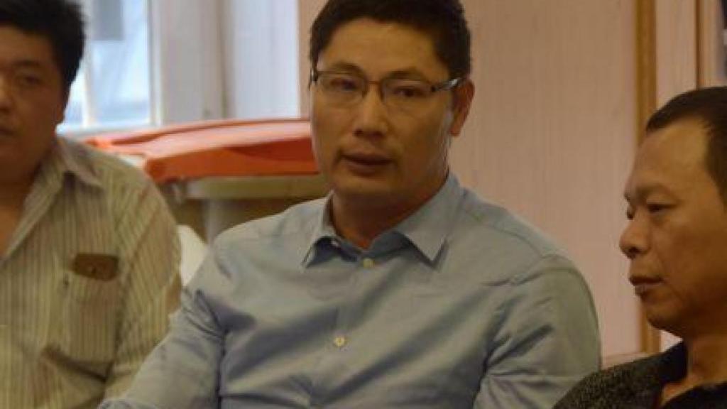 Chen Shengli en una reunión.